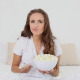 Young Woman Eating Bowl Of Popcorn On Bed 2 - VideoHive Item for Sale