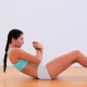 Fit Brunette Doing Abdominal Crunches - VideoHive Item for Sale