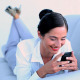 Attractive Businesswoman Lying On Couch Texting - VideoHive Item for Sale