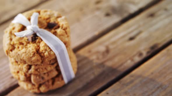 Stack of chocolate cookies tied with ribbon