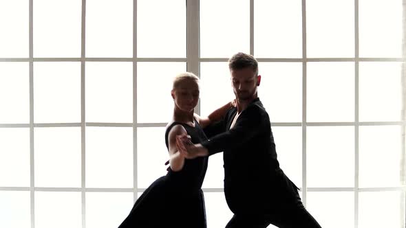 Beautiful Man and Woman Dancing Ballet