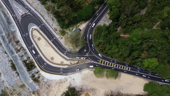 Aerial look down car traffic at the Bukit Kukus highway