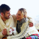 Cute Couple Cuddling Together Under A Blanket - VideoHive Item for Sale