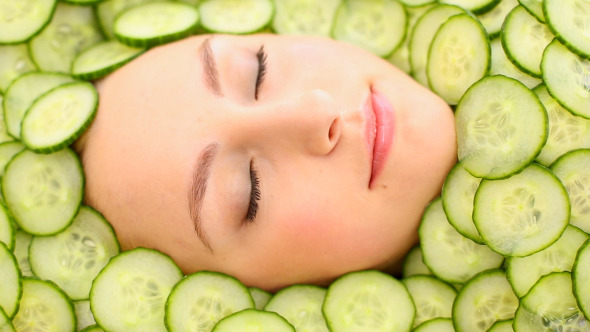 Natural Womans Face Surrounded By Cucumber Slices 1 