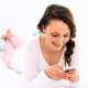 Smiling Woman Lying On Bed Texting On The Phone 2 - VideoHive Item for Sale
