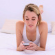 Happy Gorgeous Blonde Lying On Bed Texting - VideoHive Item for Sale