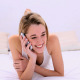 Cheerful Gorgeous Blonde Lying On Bed Phoning - VideoHive Item for Sale