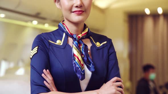 Cabin Crew or Air Hostess Working in Airplane