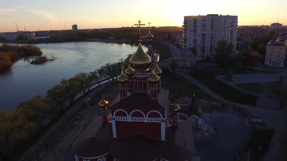 Aerial Drone Shot the Church on a Sunny Sunset on the Background of the Great