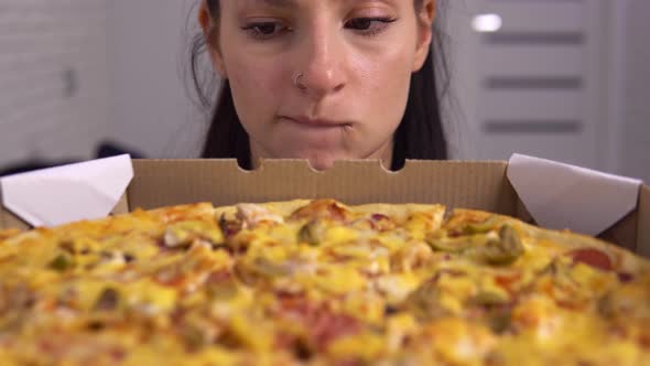 Hungry Dieting Woman Looking at Pizza Biting Lips