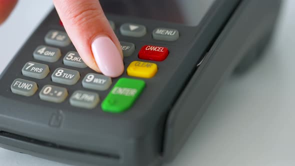 Woman Paying with Contactless Credit Card