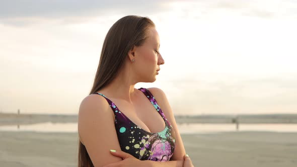 Sensual Woman in Black Bikini Standing and Enjoying Sunshine