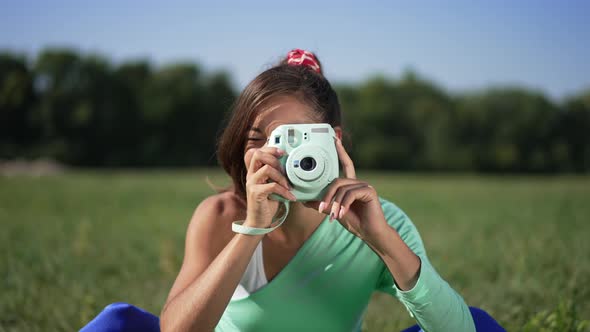 Talented Caucasian Retro Woman with Camera Taking Picture Smiling