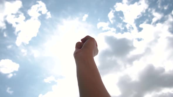 The Raised Fist. Black Lives Matter, USA Protests. White Man Raises His Fist To the Sky During a