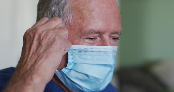 Portrait of senior caucasian man wearing face mask