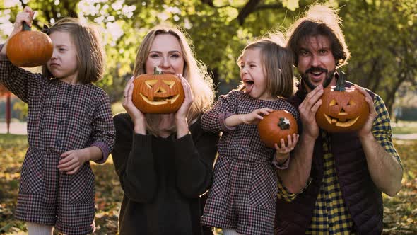 Funny face with Halloween pumpkins