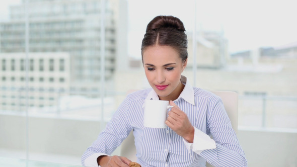 Young Businesswoman Having A Coffee Break