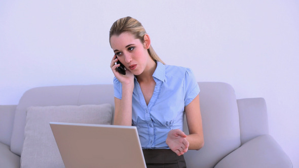 Stylish Content Businesswoman Using Laptop