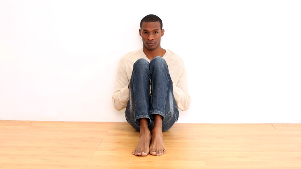 Anxious Man Sitting On The Floor