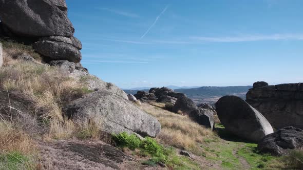 Large boulders on mountain of Monsanto village, Portugal. Panning