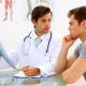 Earnest Doctor Discussing Xray With His Patient - VideoHive Item for Sale