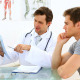 Handsome Doctor Discussing Xray With His Patient - VideoHive Item for Sale