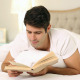 Smiling Handsome Man Reading In Bed - VideoHive Item for Sale