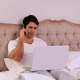 Happy Handsome Man Working In Bed - VideoHive Item for Sale