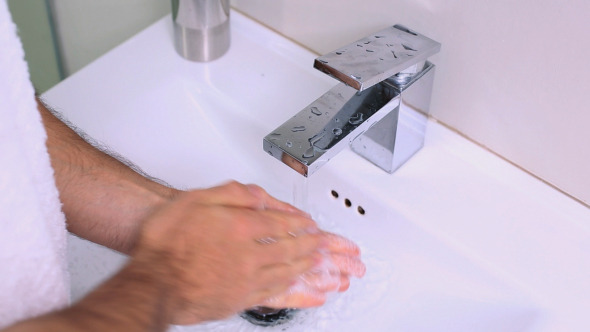 Man Washing Hands With Soap