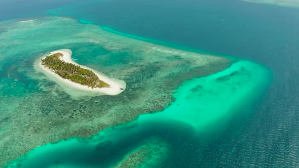 Travel Concept with a Sandy Beach and Blue Sea alt