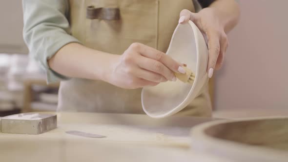 Unrecognizable Female Artisan Making Clay Plate