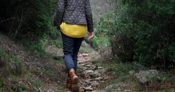 Woman in atmospheric forest