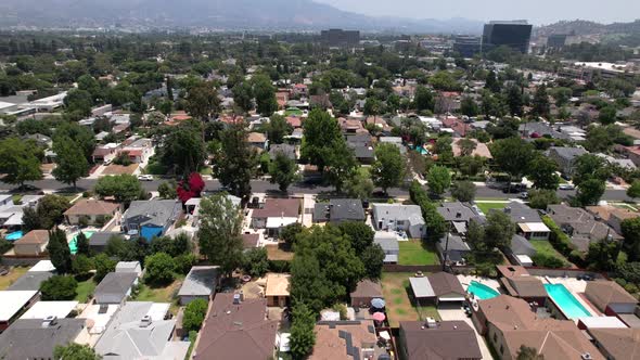 Flying over a suburban neighborhood in Burbank, California in summer