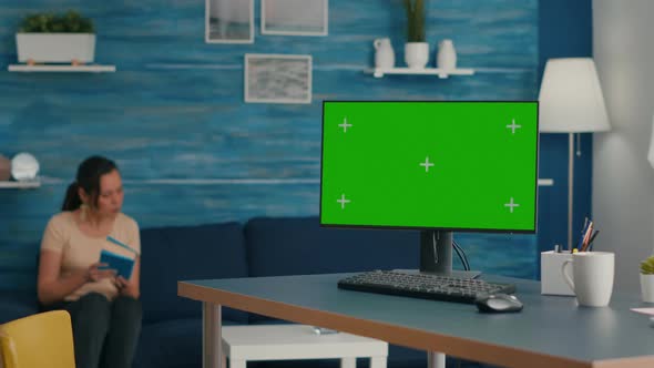 Powerful Computer with Mock Up Green Screen Chroma Key Stands on Office Desk