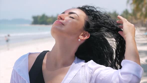 On a Tropical Beach Close-Up Portrait of European Beautiful Cute Brunette Young Woman or Cheerful