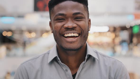 Closeup Young African American Guy Looking at Camera Posing Smiling Toothy Dental Smile Emotional
