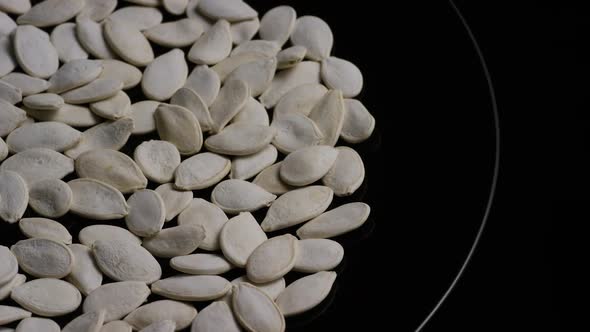 Cinematic, rotating shot of pumpking seeds - PUMPKIN SEEDS 009