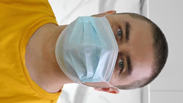 Man in Medical Mask Stay at Home