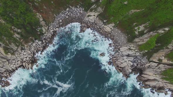 Aerial View of the Beautiful Sea Coast with Clear Blue Water at Sunset