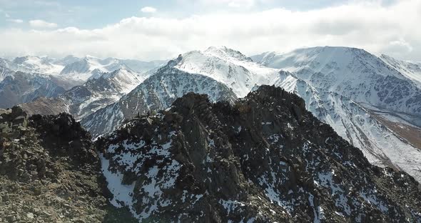 Top View of a Group of Tourists on a Peak