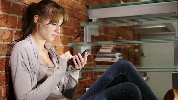 Woman Browsing Online on Smartphone Internet