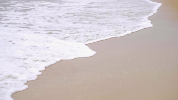 Waves on a Sandy Beach