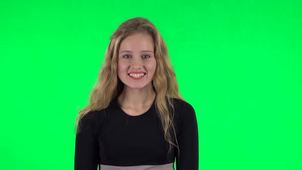 Blonde Surprised Girl with Shocked Wow Face Expression. Green Screen