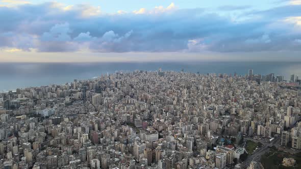 Drone Shot - Fly over Beirut showing east beirut and ending with Beirut Central Park