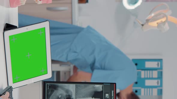 Vertical Video Orthodontist Using Horizontal Green Screen on Tablet