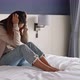 Lonely young woman feeling depressed and stressed sitting in the bedroom - VideoHive Item for Sale