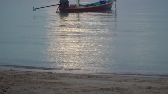 Boat at Sunrise on Water