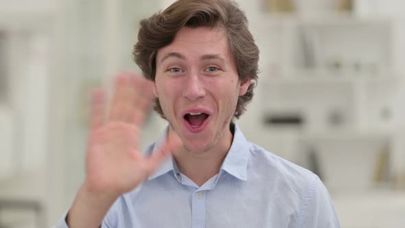 Cheerful Casual Young Man Waving, Hello 