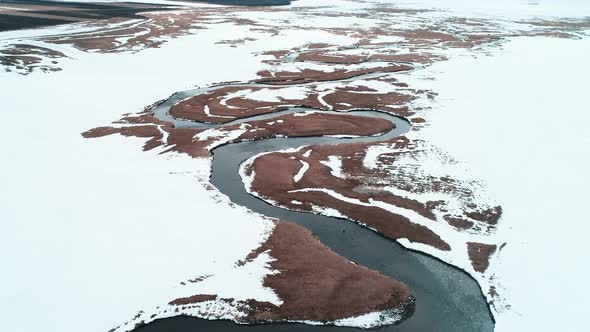 River on Snow Covered Ground