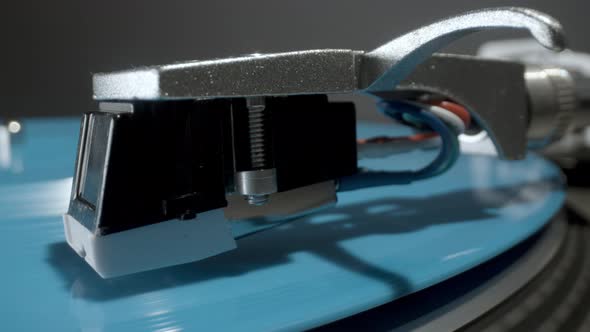 Stylus on Record Player with Blue Vinyl